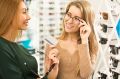 Woman buying eyeglasses with her FSA credit card